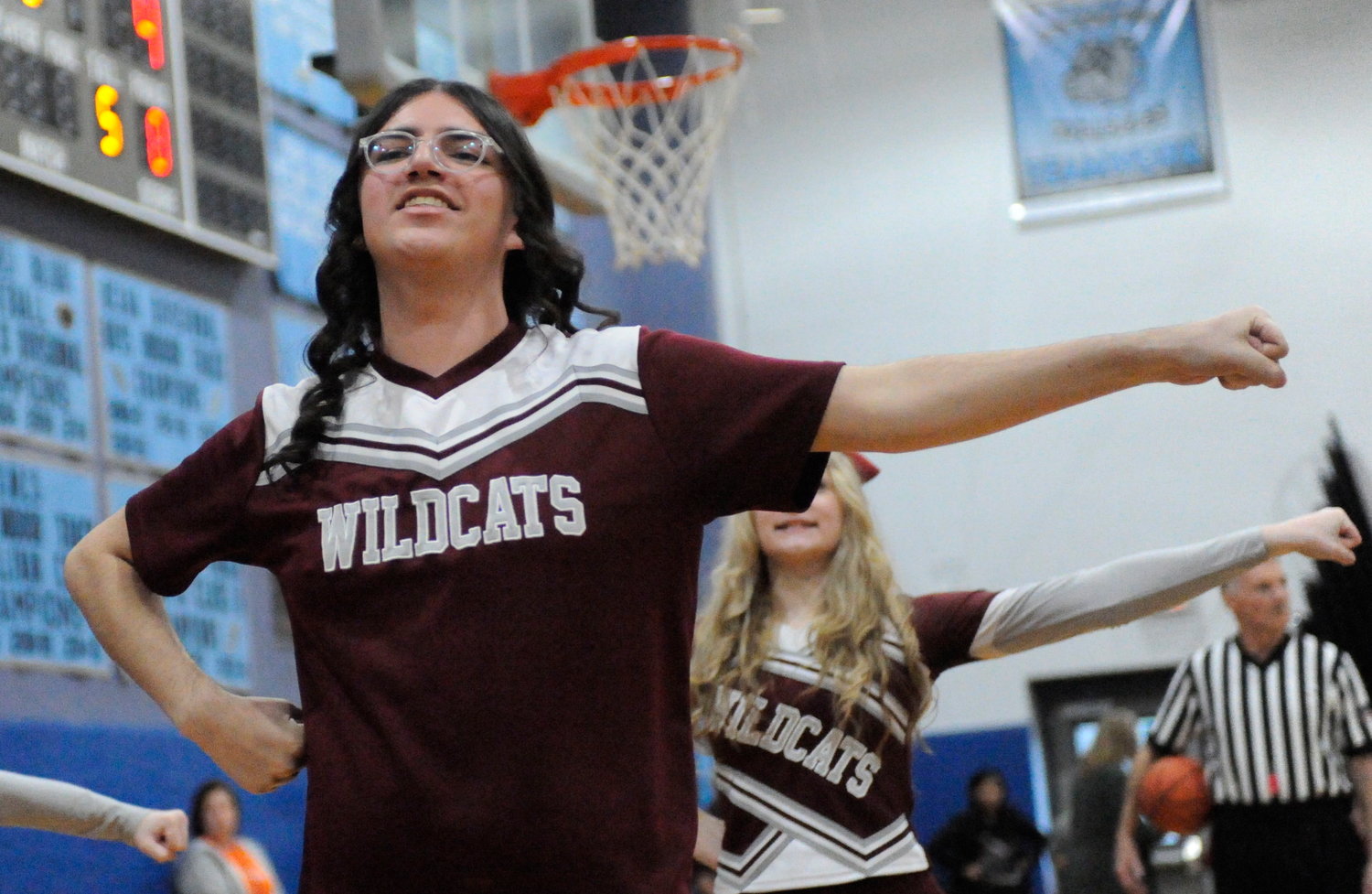 Leading a cheer. Anthony Mendoza, an 18-year-old senior, leads the Wildcats’ cheer squad.